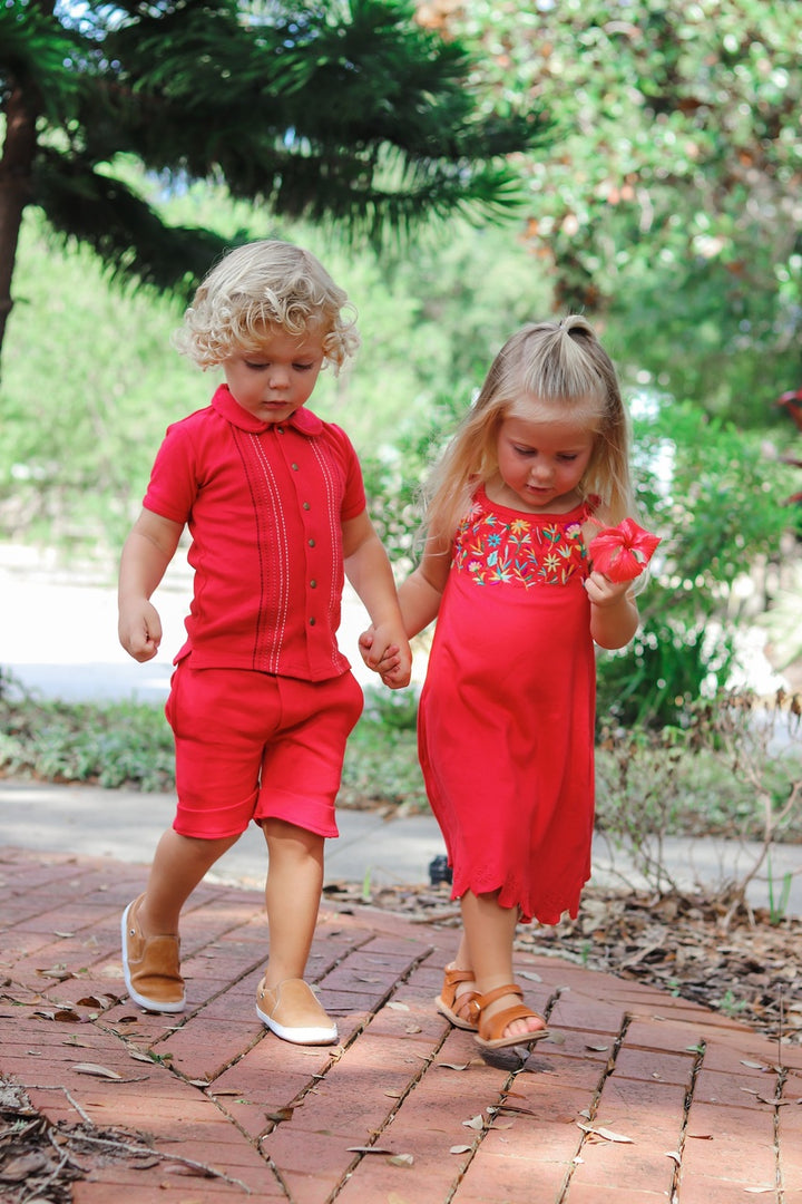 Child wearing Kids' Embroidered Twirl Dress w/Pockets in Chili Pepper Floral.