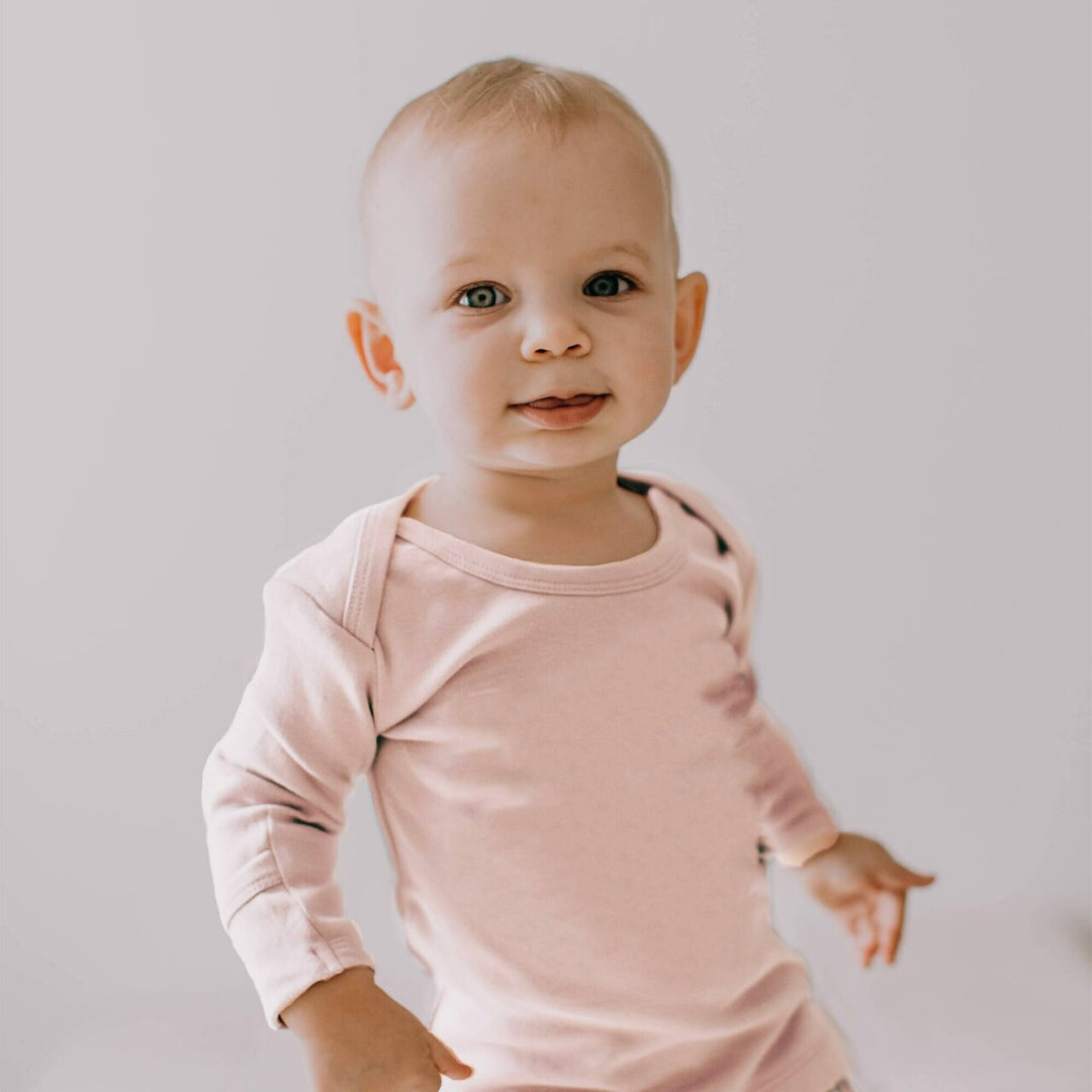 Child wearing Organic L/Sleeve Shirt in Blush.