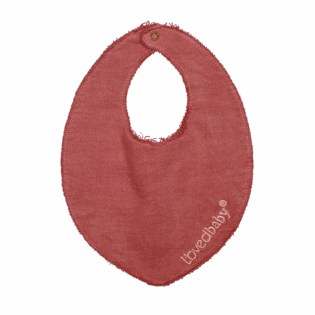 French Terry Reversible Bib in Sienna, a dark pink color.