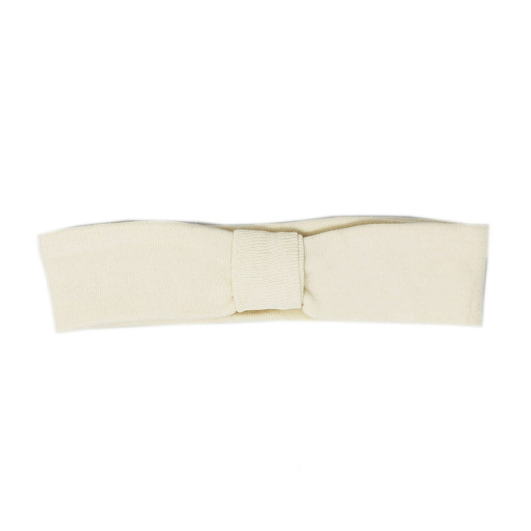 Organic Headband in Buttercream, a light beige color.