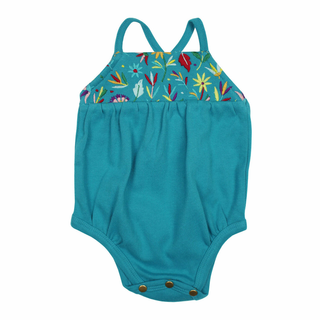 Embroidered Criss-Cross Bodysuit in Teal Floral, a greenish blue base fabric with multi colored embroiderred flowers.