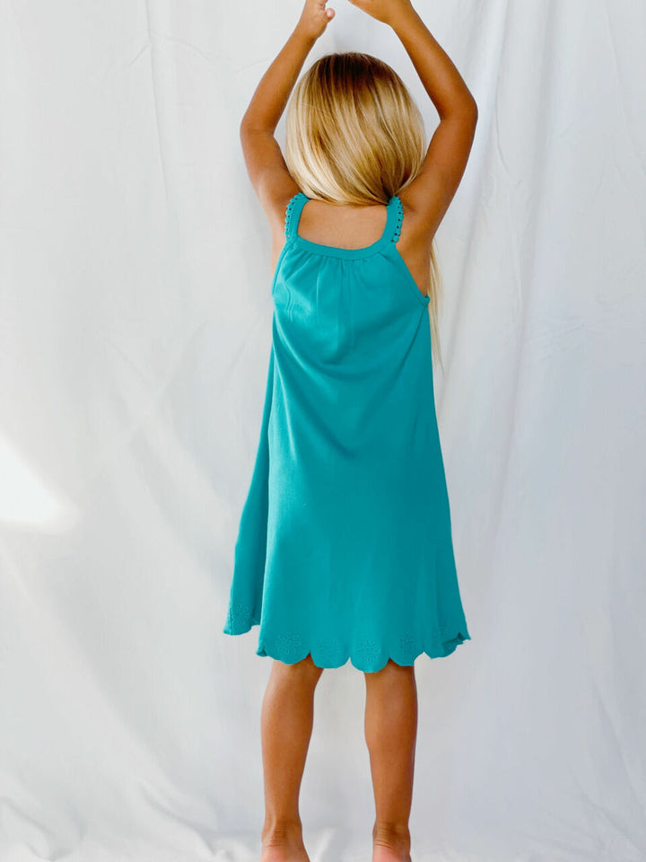 Child wearing Kids' Embroidered Twirl Dress w/Pockets in Teal Floral.
