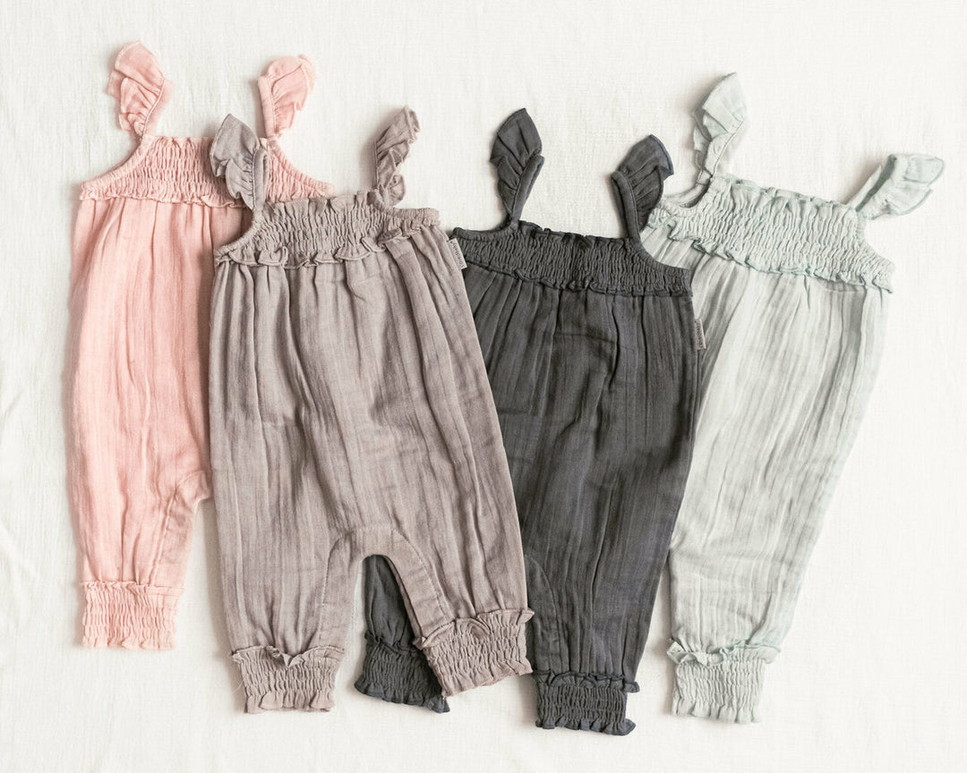 Child wearing Muslin Sleeveless Romper in Moonstone.