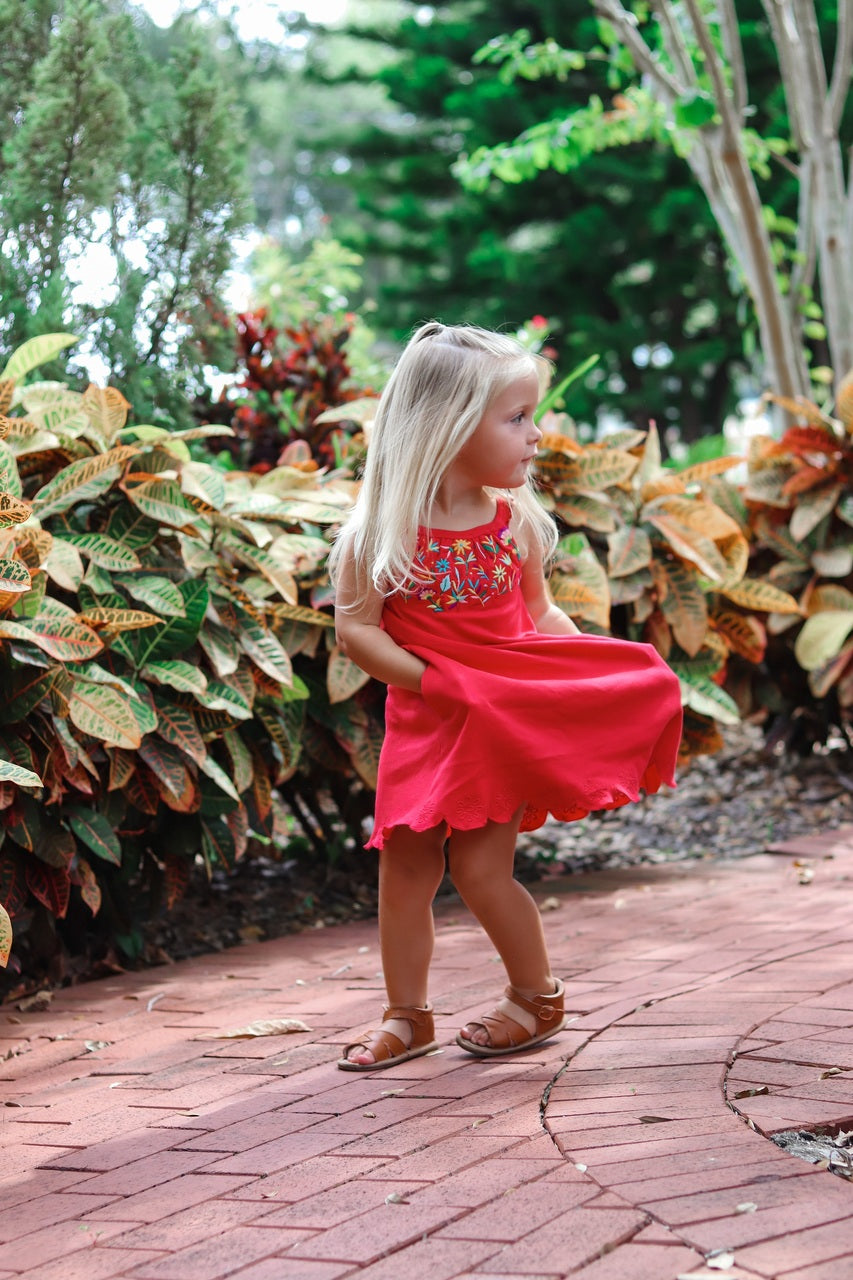Child wearing Kids' Embroidered Twirl Dress w/Pockets in Chili Pepper Floral.