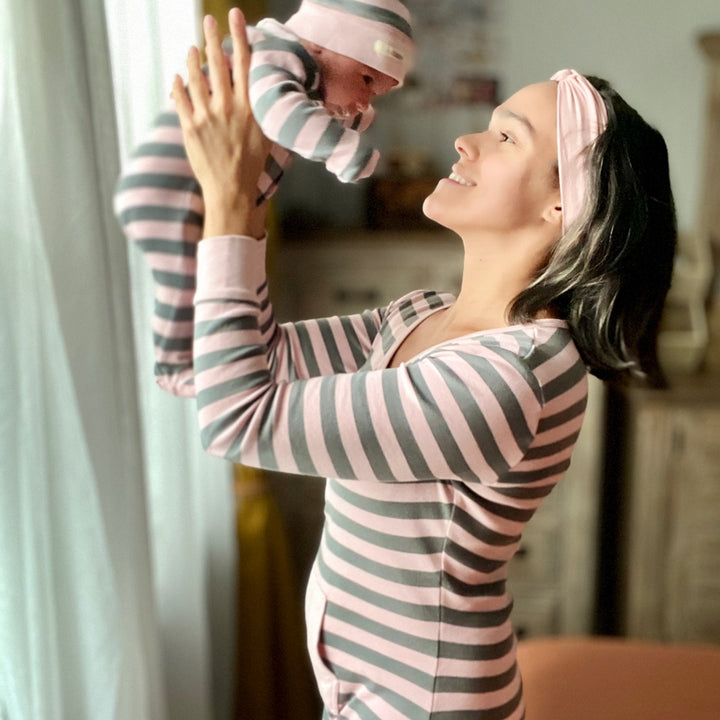 Child wearing Organic Women's Onesie in Mauve/Gray Stripe.
