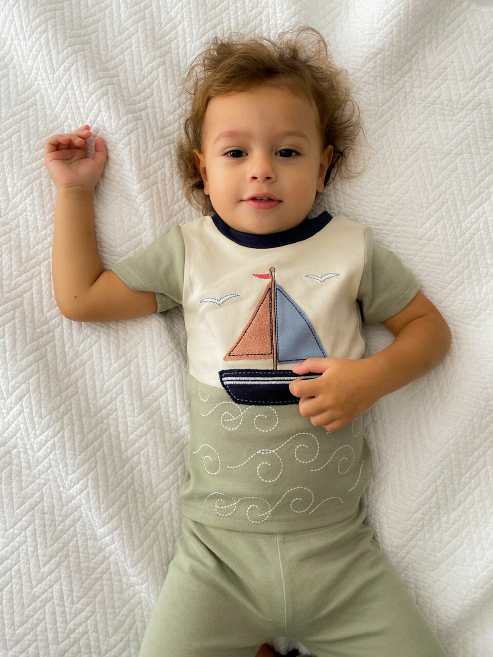 Child wearing Kids' AppliquÃ© Short Sleeve PJ Set in Sailboat.