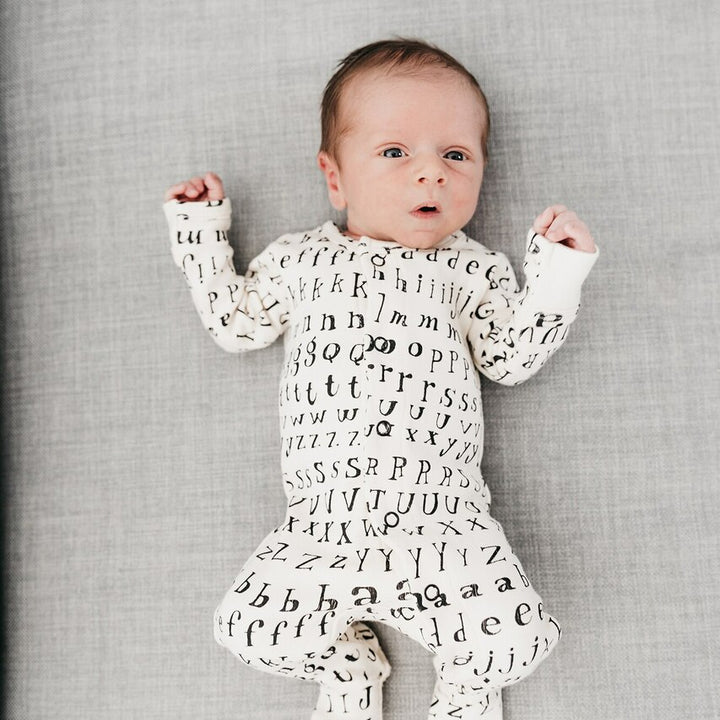 Organic Jumpsuit in Beige Letters, Lifestyle
